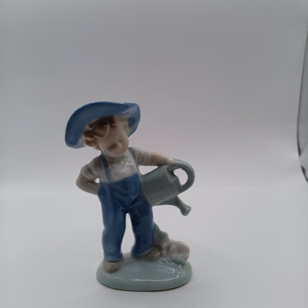 Vintage Porcelain Boy Figurine with Watering Can Blue Overalls Sun Hat 4.75 Inch
